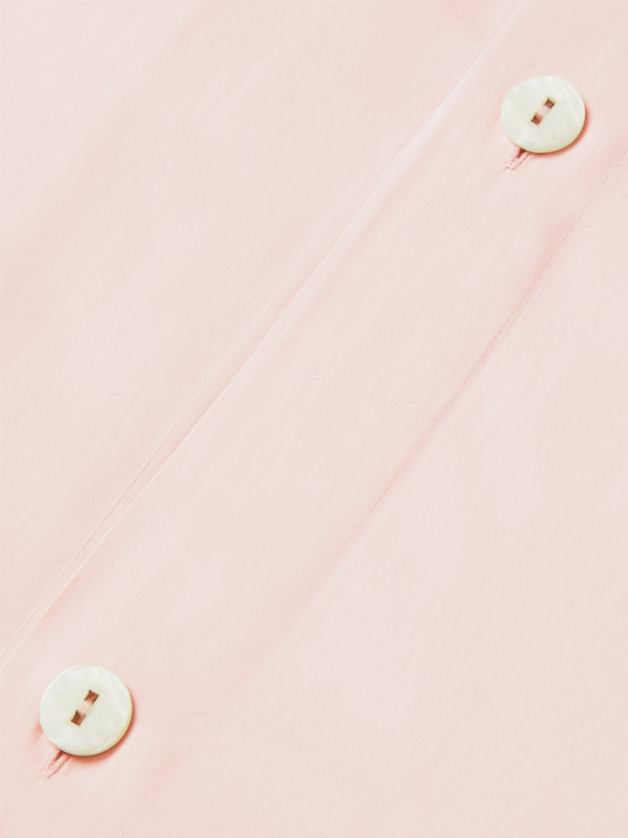 An elegant Kyoto Blush-colored duvet with a button closure.