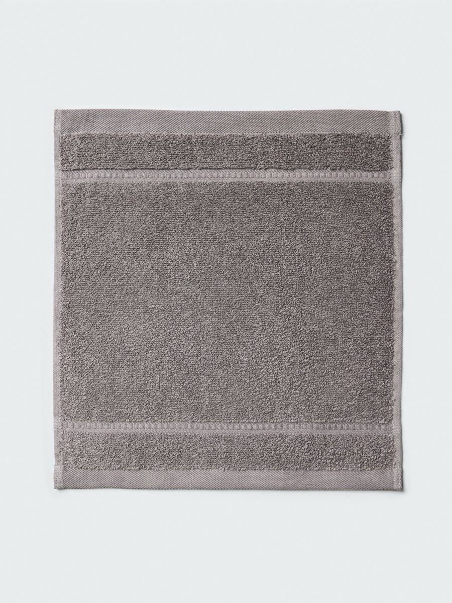 Close-up of a "Hampshire Charcoal" colored bath wash cloth , visible fabric