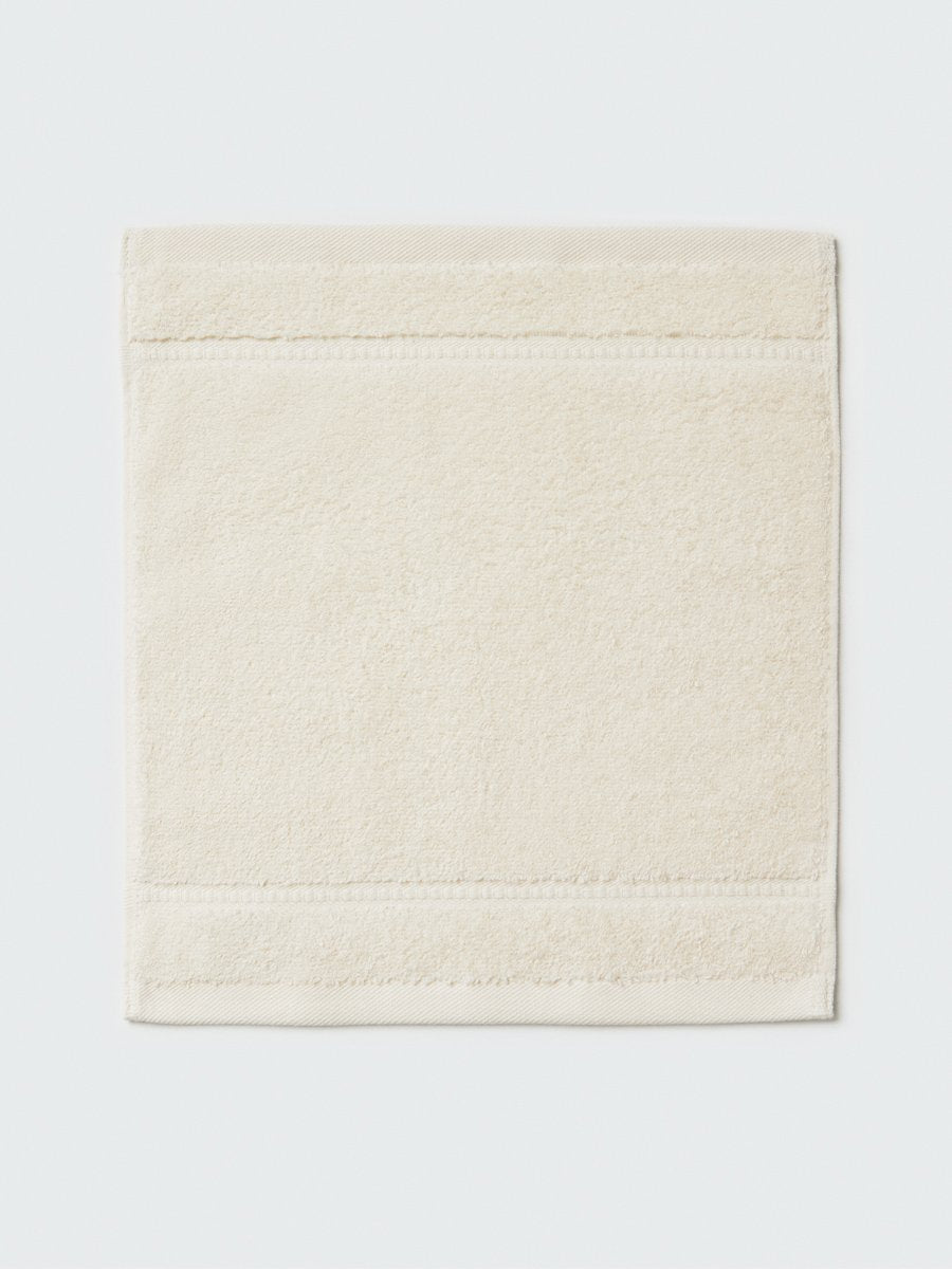 Close-up of a "Balinese Pearl" colored bath wash cloth, visible fabric
