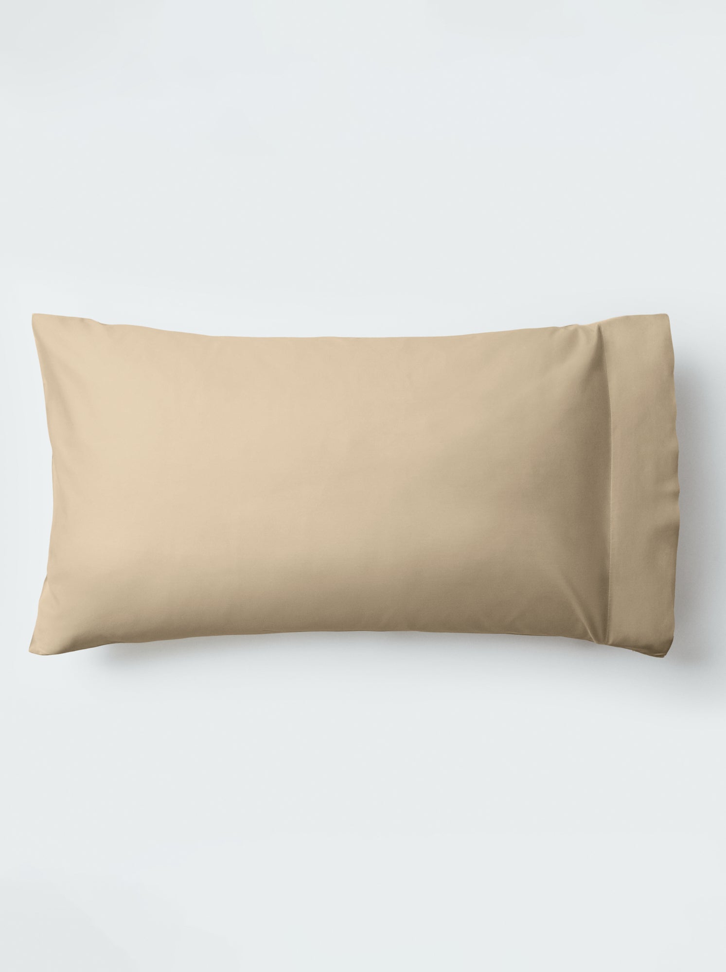 A pillow with an elegant Egyptian Camel color pillowcase.