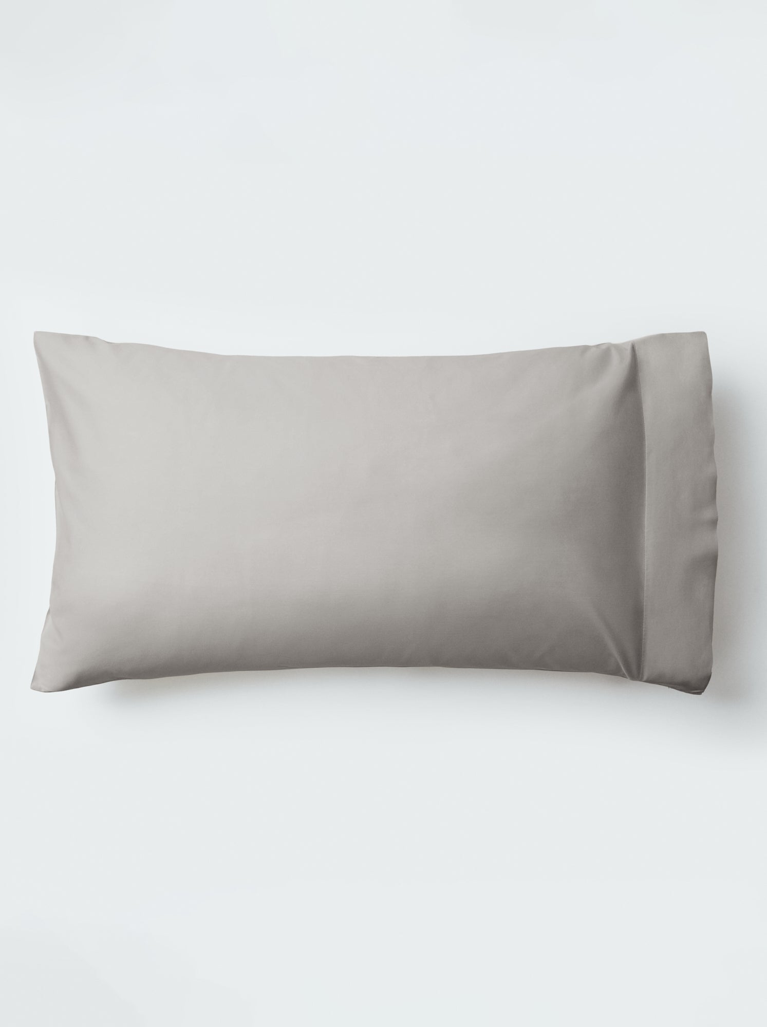 A pillow with an elegant Spanish Slate color pillowcase.