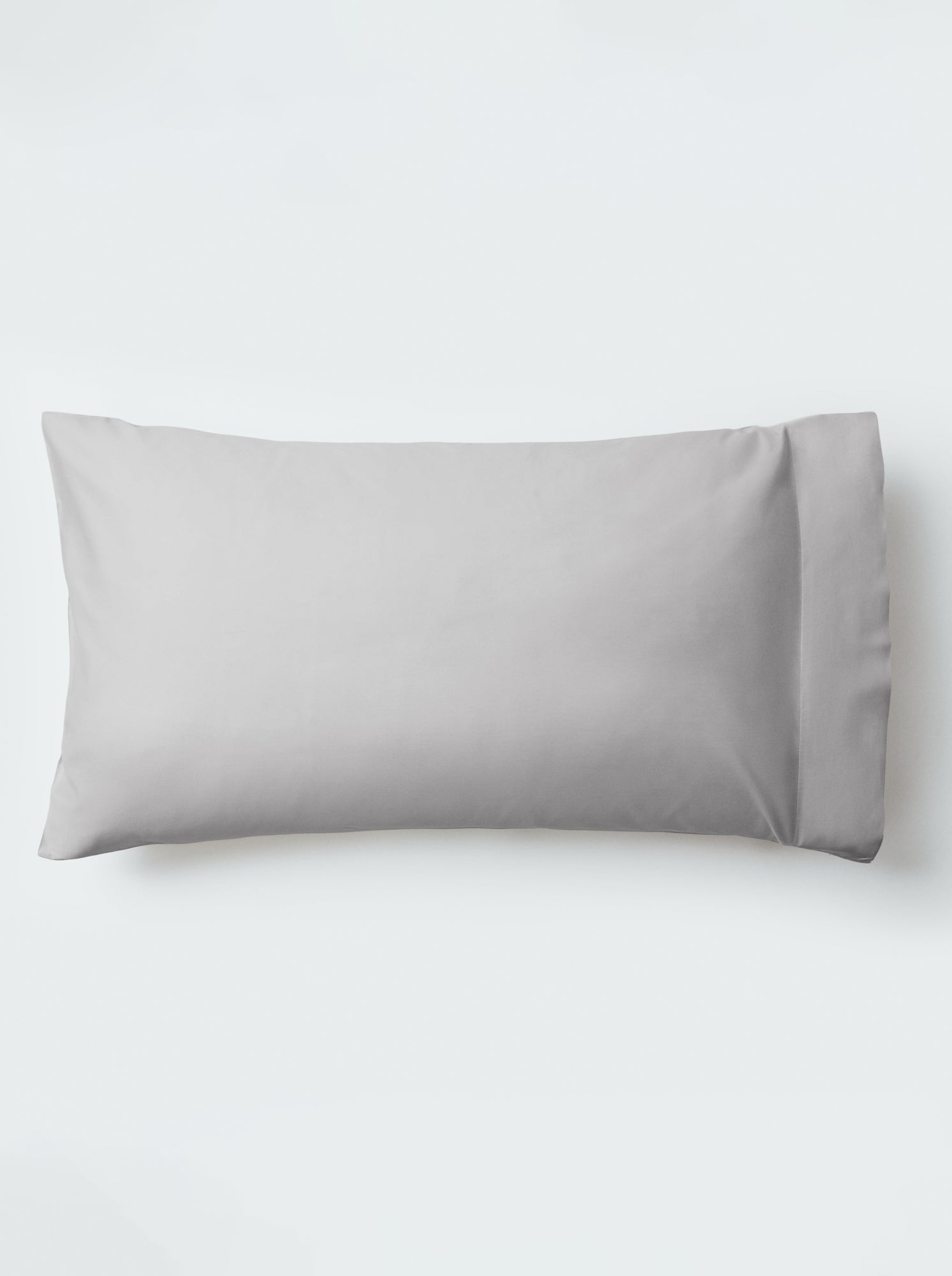 A pillow with an elegant Turkish Silver color pillowcase.