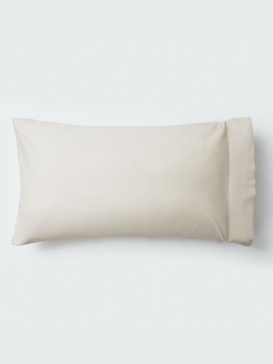 A pillow with an elegant Balinese Pearl color pillowcase.