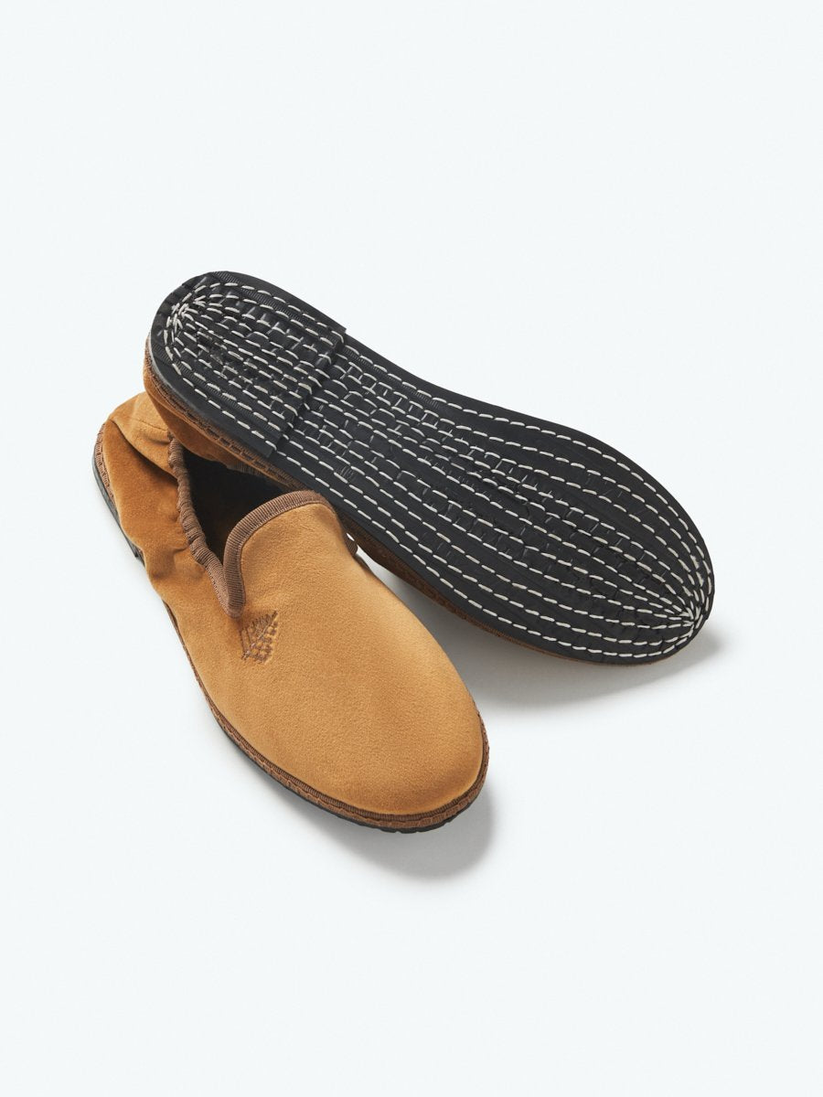 Close-up of the Four Seasons Velvet Slippers in Egyptian Camel, showcasing the luxurious velvet fabric and artisanal hand-stitching.