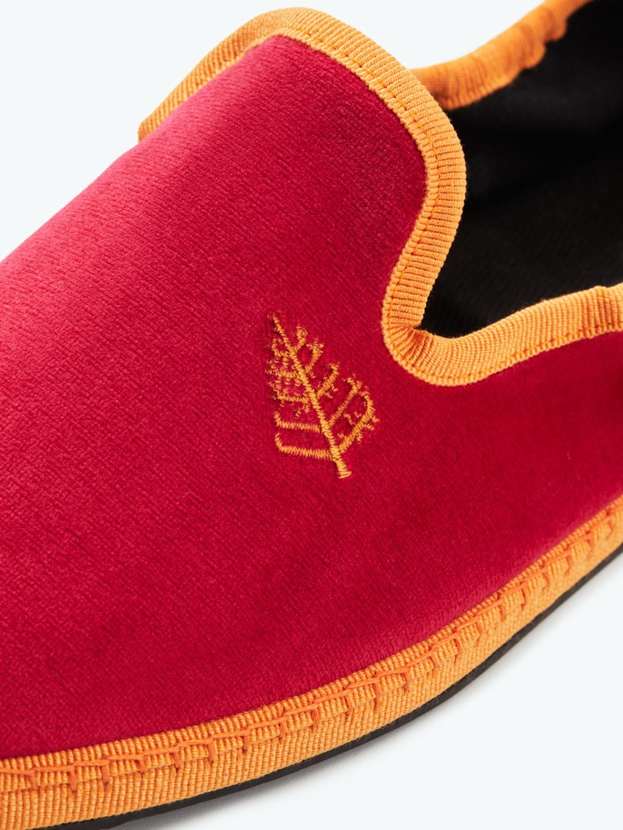 Close-up of the Four Seasons Velvet Slippers in Miami Rose, showcasing the embroidered Four Seasons logo.