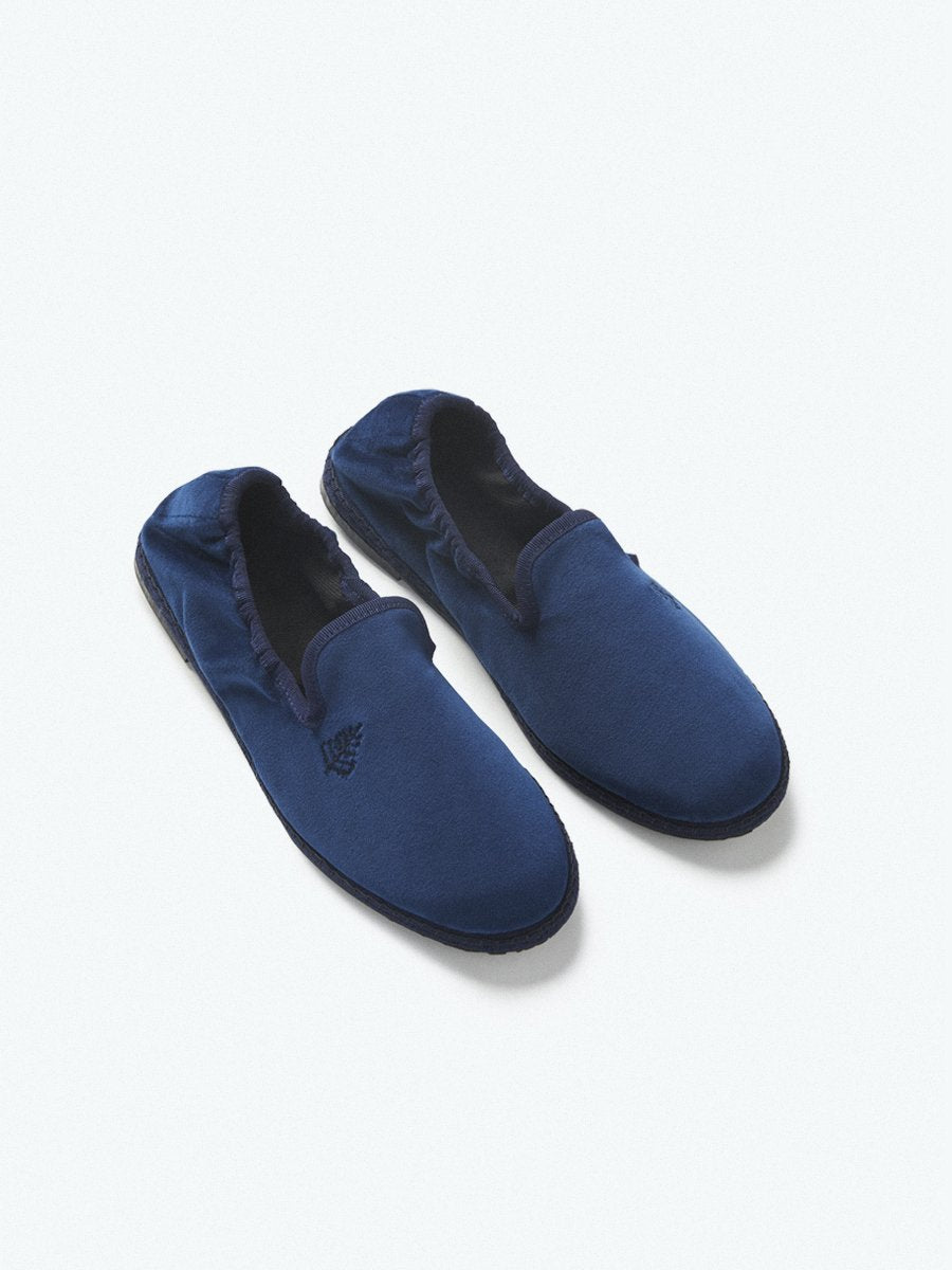 Close-up of the Four Seasons Velvet Slippers in Riviera Navy, showcasing the luxurious velvet fabric and artisanal hand-stitching.