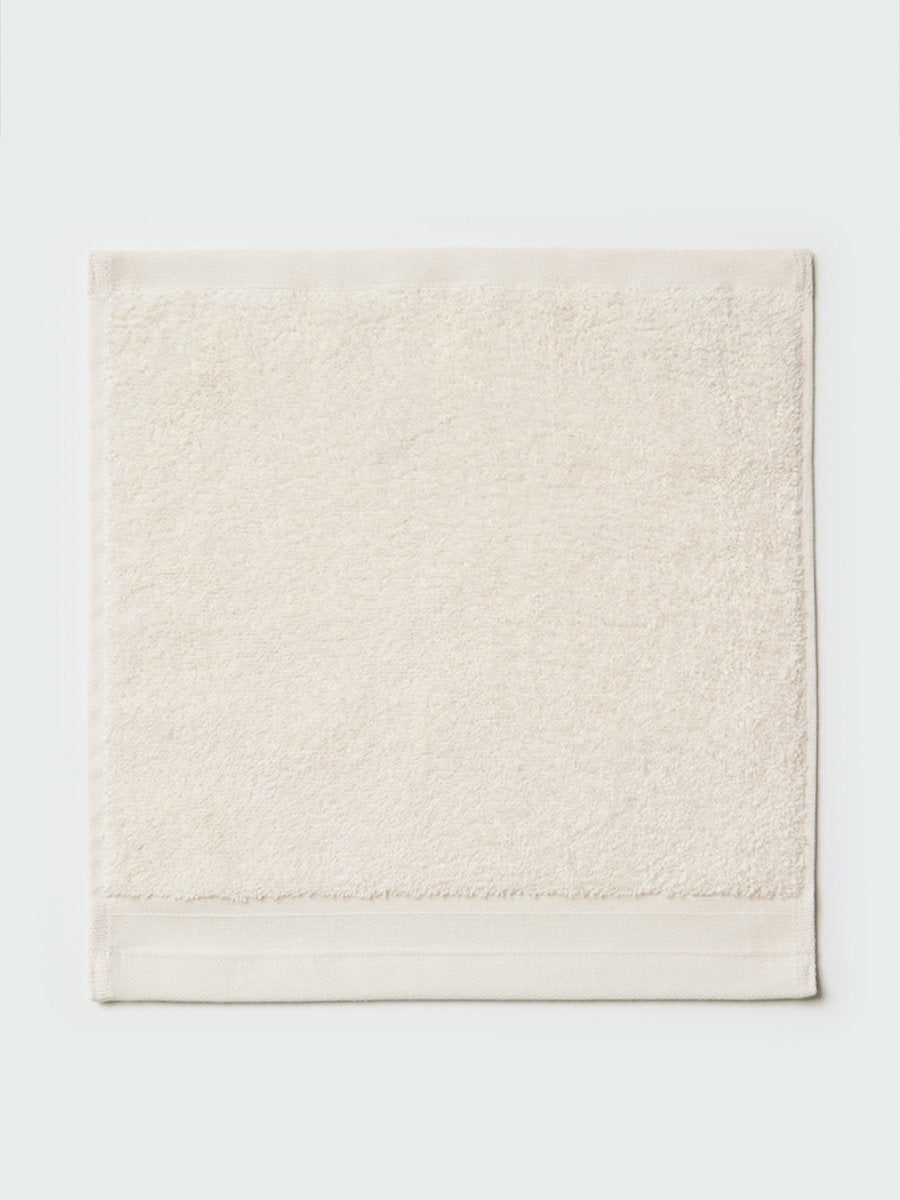 Close-up of a "Balinese Pearl" colored bath wash cloth, visible fabric