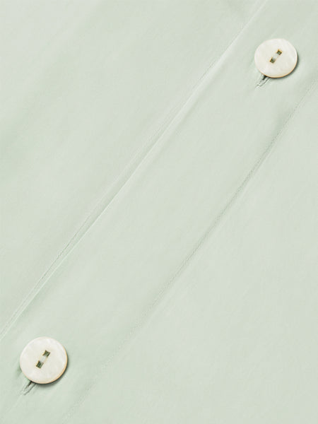 An elegant Florentine Sage-colored duvet with a button closure.