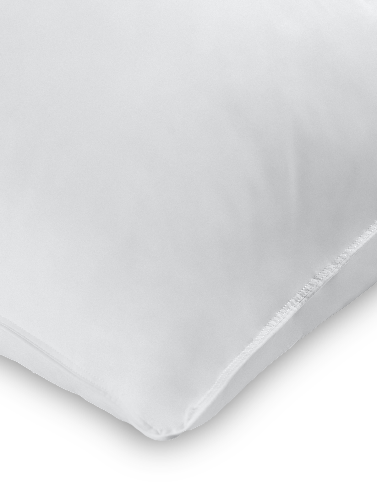 Close-up of a corner of a Signature White color pillow.