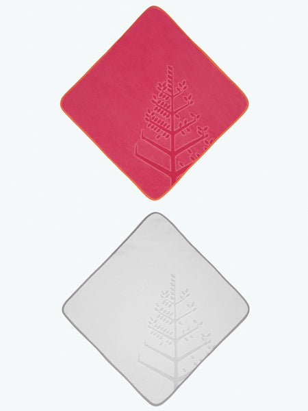 Two baby hooded towels: one in a vibrant Coral Reef Pink and one in a soft Mountain Grey, each featuring an embroidered Four Seasons logo.