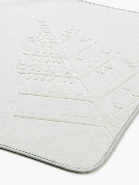 Close-up of a "Safari Sage" hooded baby towel with an embroidered Four Seasons logo.