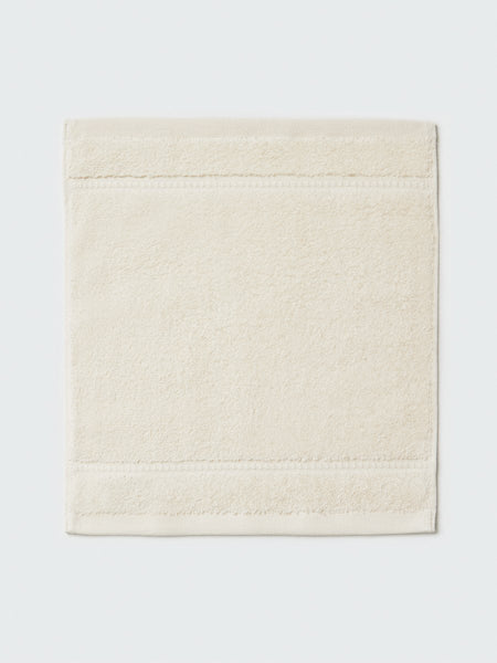 Close-up of a "Balinese Pearl" colored bath wash cloth, visible fabric