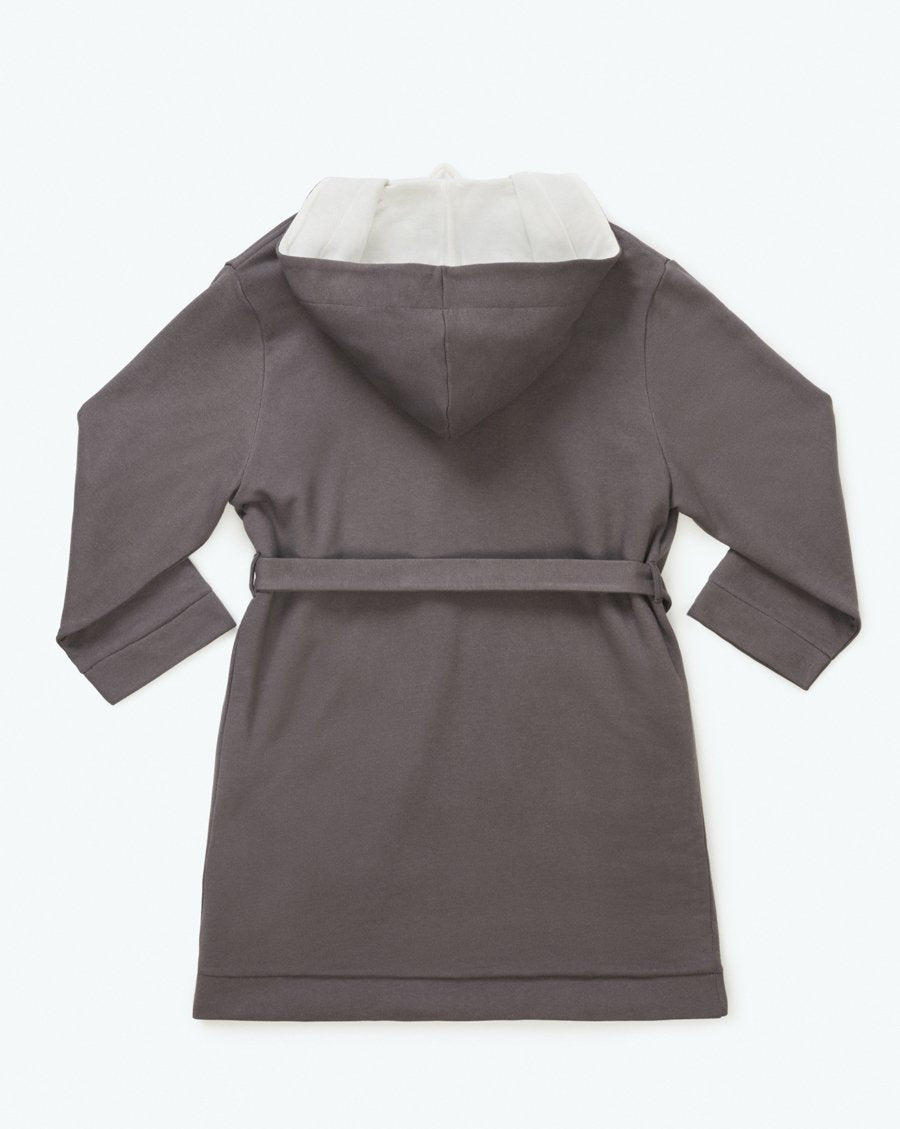 The back-facing hooded robe features a mid-length design with a bamboo cotton interior for exceptional softness and comfort