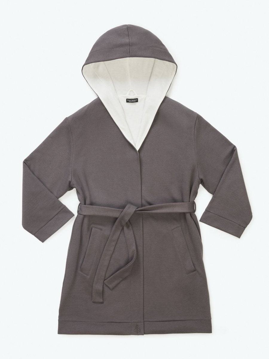 The hooded robe from the front view features a mid-length design with a bamboo cotton interior for exceptional softness and comfort. The exterior features a Hampshire Charcoal hue in a neutral colorway.