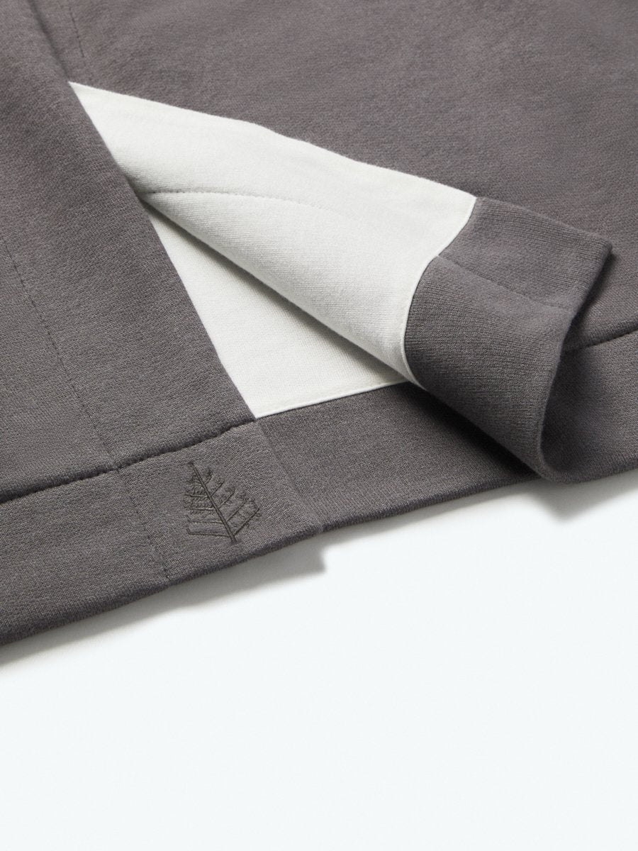 The exterior of the robe features a Hampshire Charcoal tone, while the inner lining is white, creating a pleasant visual contrast.