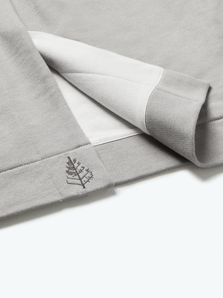 The exterior of the robe showcases a soft and uniform gray tone, while the interior lining is white, creating a pleasing visual contrast.