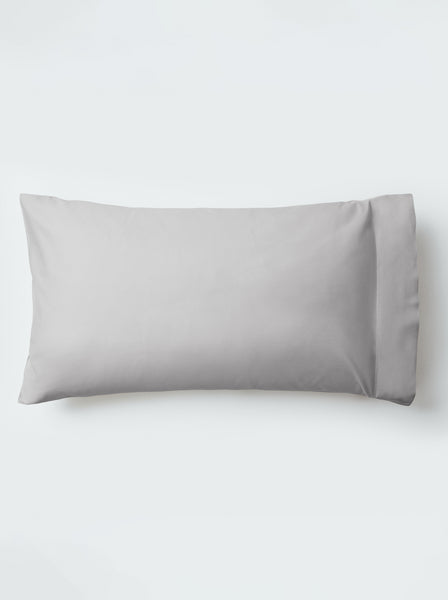A pillow with an elegant Turkish Silver color pillowcase.