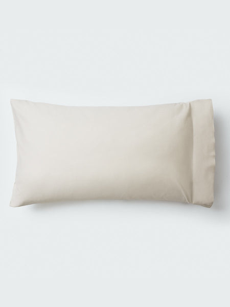 A pillow with an elegant Balinese Pearl color pillowcase.