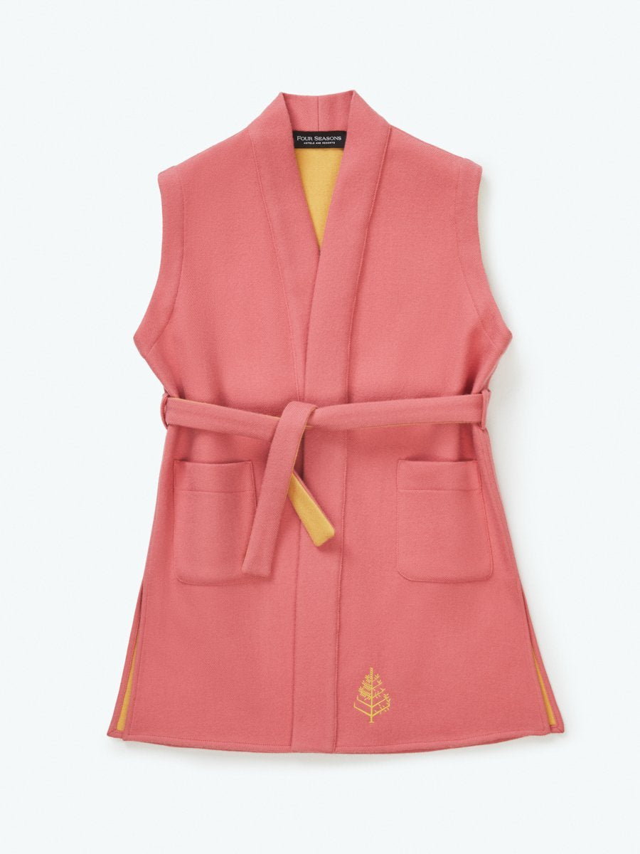 Front view of Four Seasons Resort children's sleeveless lightweight wool robe, pink with yellow interior, elegant and stylish
