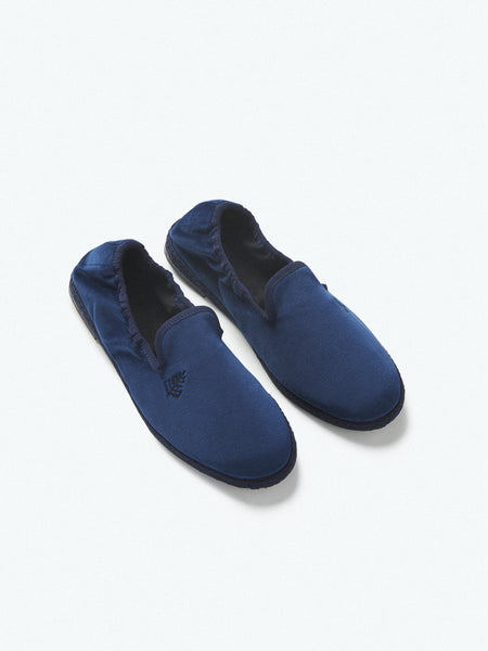 Close-up of the Four Seasons Velvet Slippers in Riviera Navy, showcasing the luxurious velvet fabric and artisanal hand-stitching.