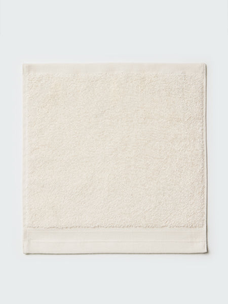 Close-up of a "Balinese Pearl" colored bath wash cloth, visible fabric